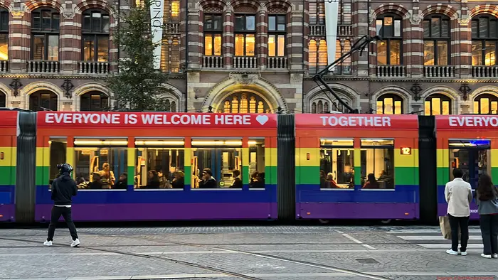 Tram with banner: Everyone is Welcome Here